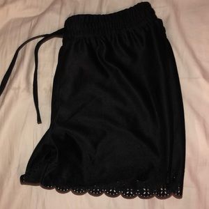 Frilly black shorts